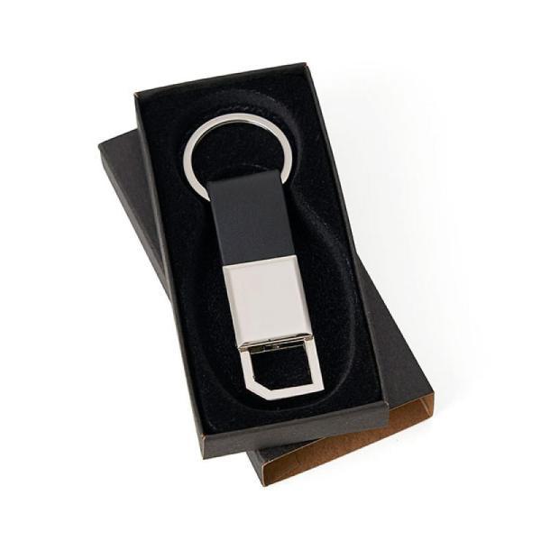 Chaveiro em metal cromado e material sintético preto
